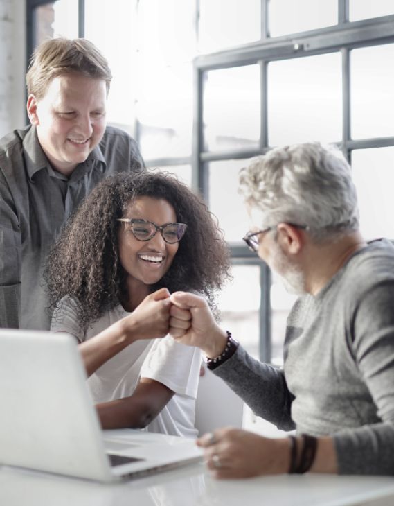 Team working on laptops